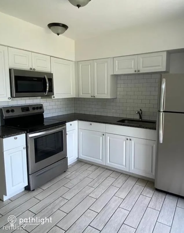 Building Photo - 3 br, 1 bath House - 2924 Elm Street UNIT