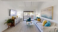 Located at 15123 Brookhurst St in Westminster, CA, this 1-bedroom, 2-bathroom residence offers a well-organized single-floor layout that maximizes every inch of its living space. The living room is a standout, boasting vaulted ceilings with exposed wood beams and a sliding glass door that opens to a private balcony with outdoor views of mature trees, filling the room with natural light and a relaxed California ambiance. Soft carpeting and crisp white walls carry throughout the living and bedroom areas, creating a clean, cohesive aesthetic. The dining area sits adjacent to the living room and features a large window overlooking the greenery outside, making it a bright and pleasant space for meals. The kitchen is efficiently designed with white cabinetry, granite-style countertops, wood-look flooring, and full appliances, including a full-size refrigerator. The spacious primary bedroom offers generous proportions, plush carpeting, a large window with outdoor views, a dedicated closet, and direct access to a well-appointed bathroom. A second full bathroom, featuring a tub-shower combination and wood-look flooring, provides added convenience. Throughout the home, consistent finishes and abundant natural light contribute to a welcoming, move-in-ready atmosphere.