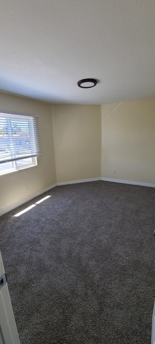 Building Photo - 9066 S Normandie Ave