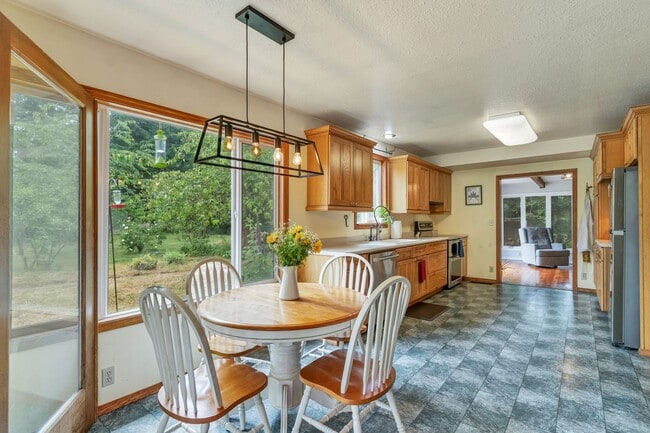 Building Photo - PRIVATE HOMESTEAD WITH ACREAGE & SHOP
