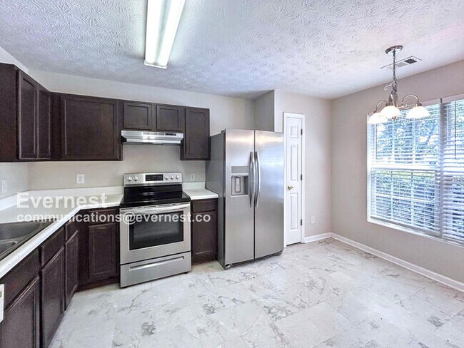 Foto del edificio - 5589 Strathmoor Manor Cir