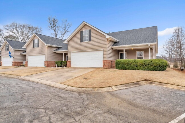 Photo - Spacious 3-Bedroom, 2-Bath Townhome with 2-Car Garage & Fireplace $1850/mo rent