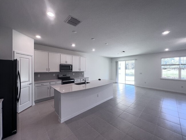 Building Photo - Available NOW! Epperson lagoon 4 Bed, 2.5 Bath Home in Wesley Chapel, FL - A Must-See Rental Prop...