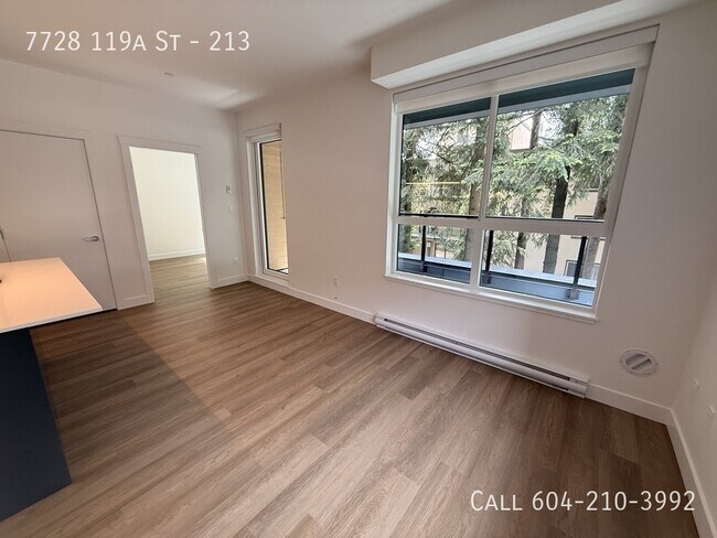 Building Photo - Modern Corner Unit Condo