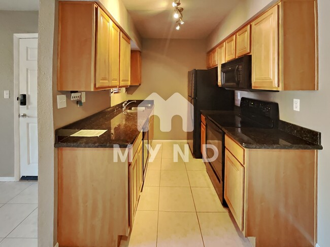 Building Photo - 5877 N Granite Reef Rd Apt 1137