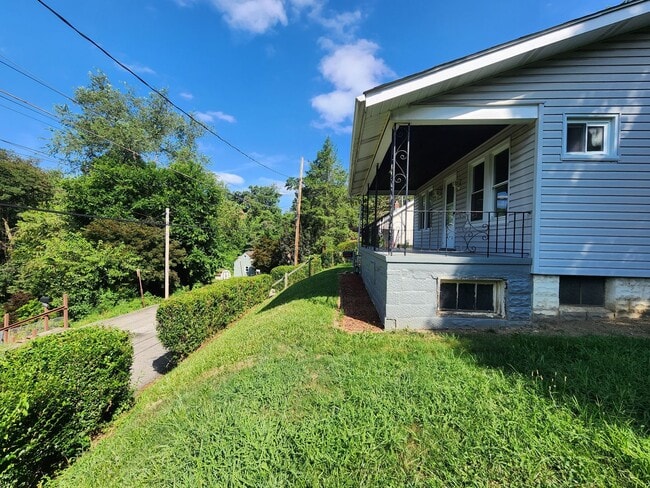 Building Photo - 4 BR home with first-floor living, new roof, and a private-feeling backyard in Lincoln Place
