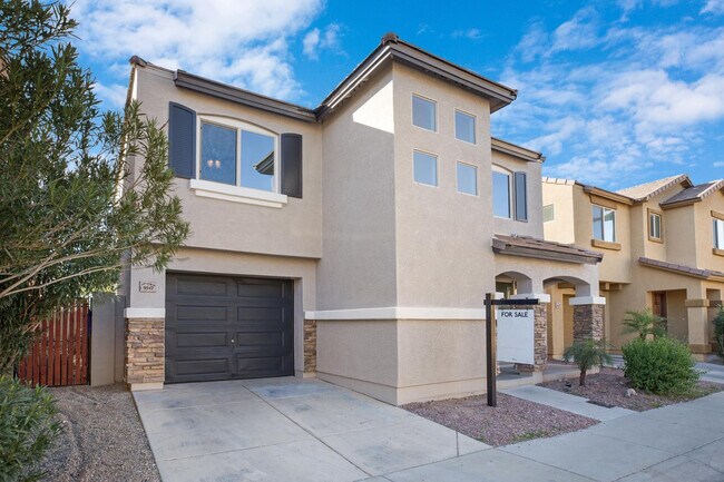 Foto del edificio - 9547 E Belmont Ave