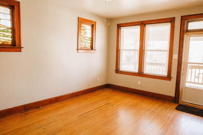 Living Room with multiple large windows for sunlight. - 2314 Grand Ave