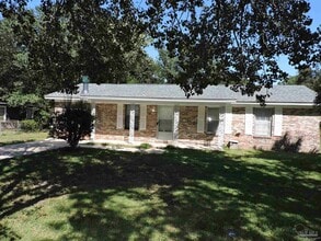 Building Photo - 6970 Woodley Dr