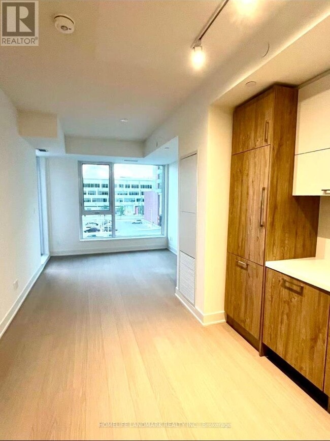 Building Photo - 38-D438 Andre de Grasse St