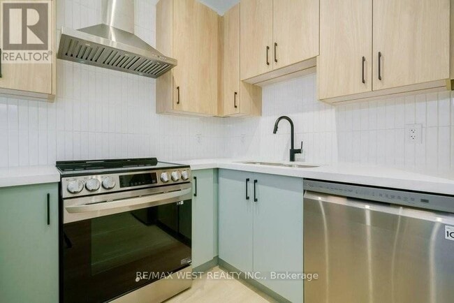 Building Photo - 2083-2083 Danforth Ave