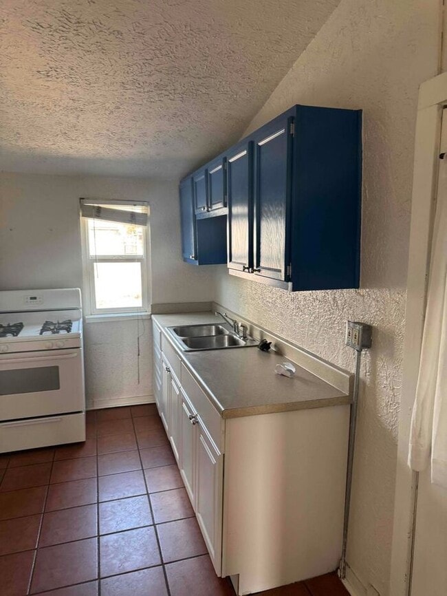 Foto del edificio - 1-Bedroom, 1-Bathroom Apartment with Conve...