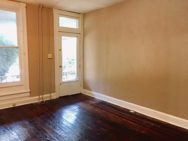 Building Photo - Spacious Three-Bedroom Remington Rowhome -...