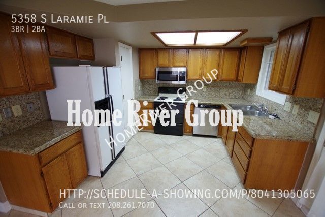 Building Photo - 5358 S Laramie Pl