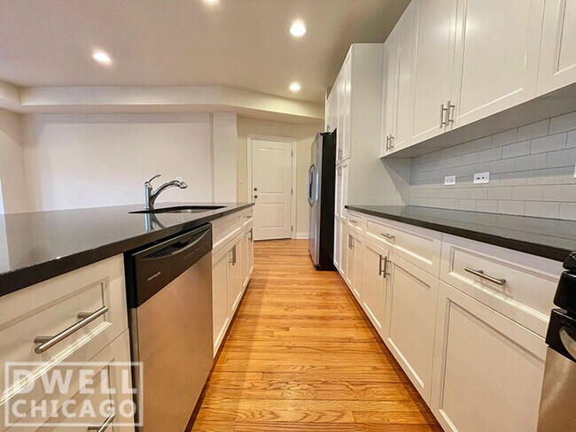 Foto del edificio - 6453 N Newgard Ave