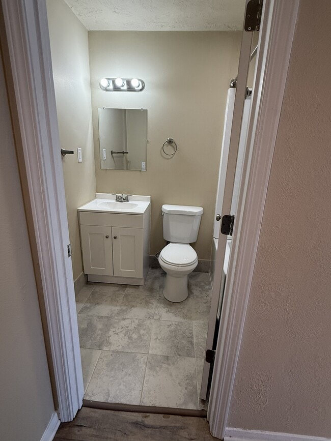 Building Photo - 210 E 13th St