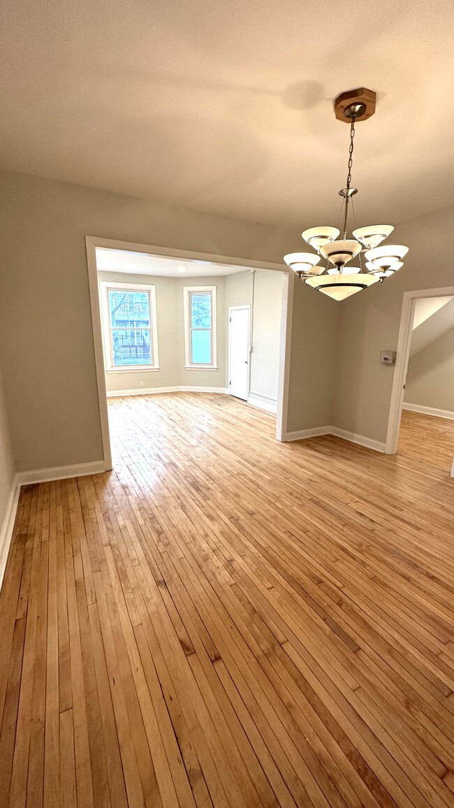 Dining room looking into living room - 4327 N Avers Ave