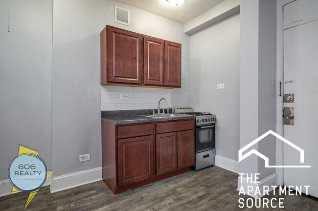 Foto del edificio - 6930 N Greenview Ave