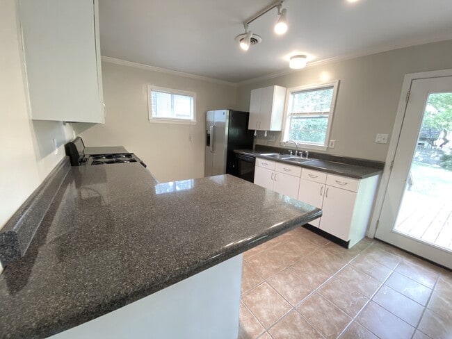 Kitchen with bar - 132 N Rembert St