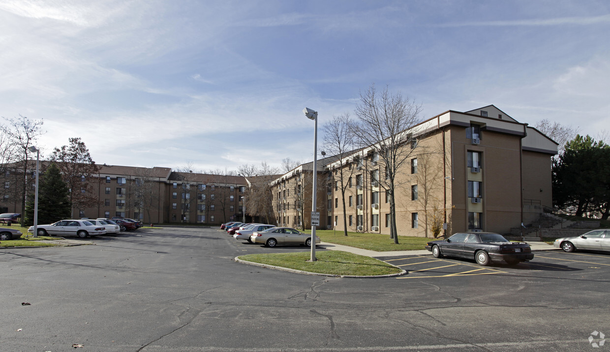 Building Photo - Woods at Cedar Village