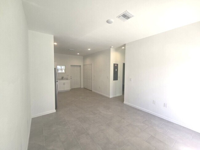 Building Photo - BRAND NEW-- TWO BEDROOM + TWO BATHROOMS