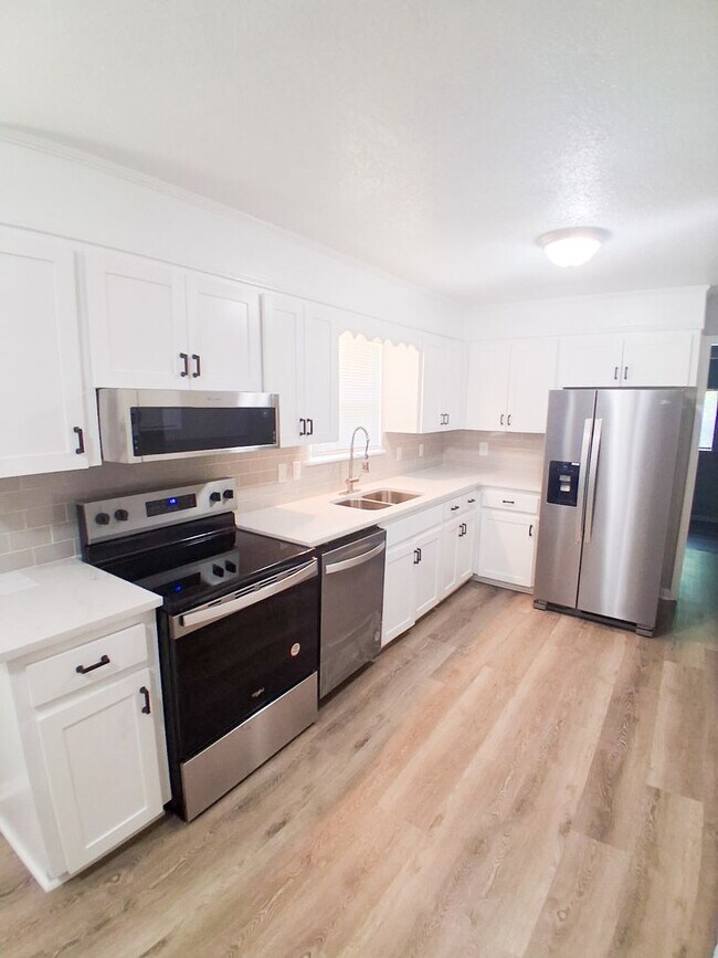 Building Photo - Completely Remodeled 4-Bedroom 2-Bath home...