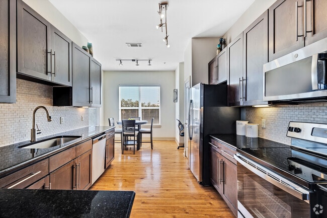 3BR, 2BA - 1,483SF - Kitchen/Dining Room - Domain at Kirby Apartments