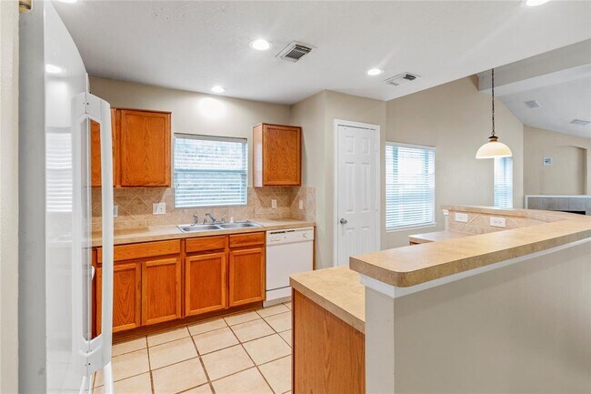 Building Photo - 18323 Atasca Wds Trce