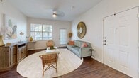 Located on Southern Oaks Blvd in Dallas, TX, this single-story 3-bedroom, 1-bathroom home offers a thoughtfully organized layout with a warm, welcoming atmosphere. The combined kitchen and living room serves as the heart of the home, where rich hardwood-style flooring, a ceiling fan, and large windows invite abundant natural light. The living area provides a comfortable gathering space, while the galley-style kitchen features slate-blue cabinetry, granite-style countertops, white appliances, a dishwasher, and a pantry for added storage.

The three bedrooms are carpeted and well-proportioned, each accompanied by a dedicated closet. The spacious primary bedroom offers room for generous furniture arrangements. The shared full bathroom is appointed with a bold navy vanity, granite-style countertop, a bright vanity light fixture, and hardwood-style flooring. A dedicated in-unit laundry area with washer and dryer hookups adds everyday convenience. A hallway connects the living spaces efficiently, and a private patio extends the living area outdoors. This home combines functional design with charming details throughout.
