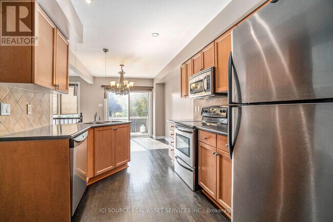 Building Photo - 108 Talltree Crescent