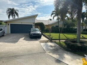 Building Photo - 5010 Woodstone Cir N