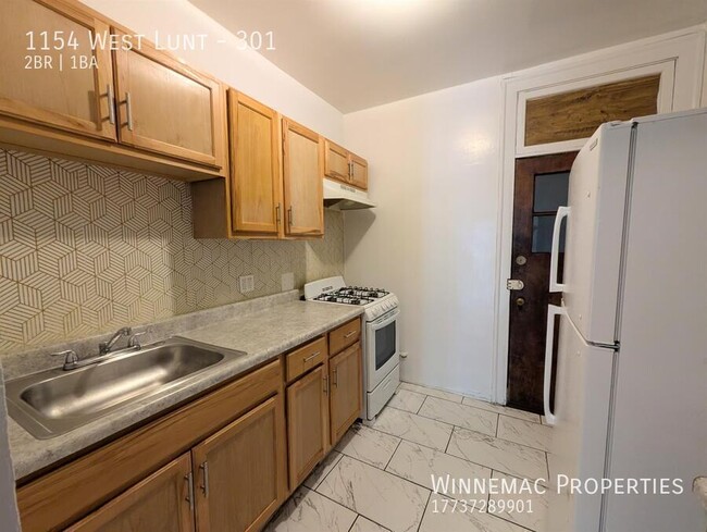 Building Photo - 1154 West Lunt-301