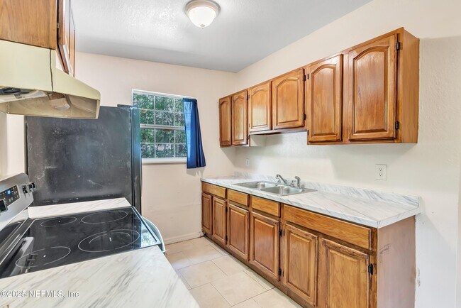 Building Photo - 4407 Melvin Cir E