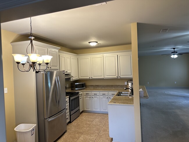 Building Photo - 5667 Magnolia de Christophe Dr