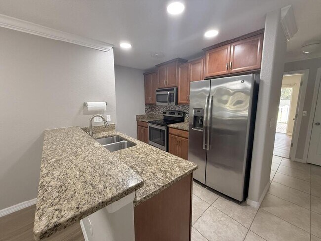 Building Photo - 9827 Trumpet Vine Loop