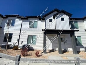 Building Photo - 573 S May Dr