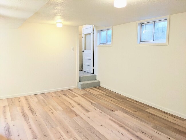 Building Photo - Cozy Basement Retreat Awaits!