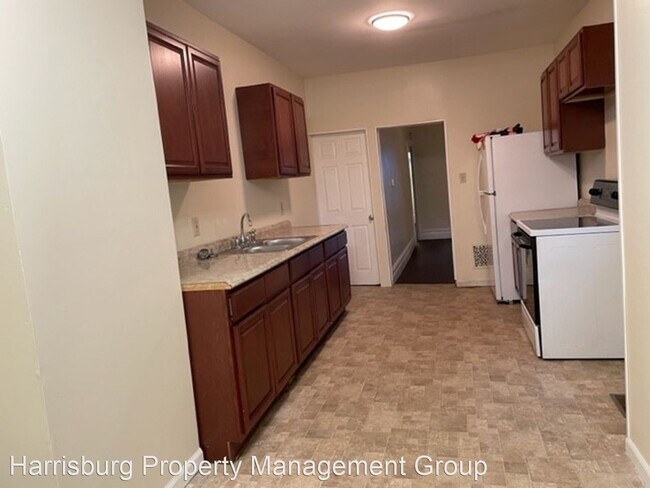 Foto del edificio - 4 br, 1 bath House - 220 S 15th St
