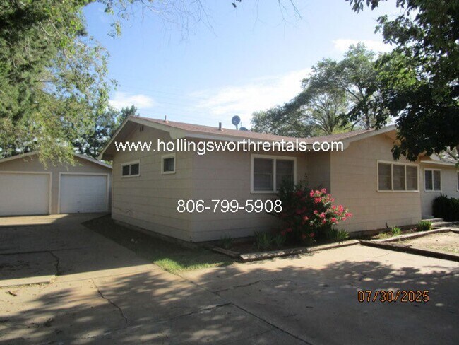 Foto del edificio - 4 bedroom, 2 bath, 2 car garage with shop ...