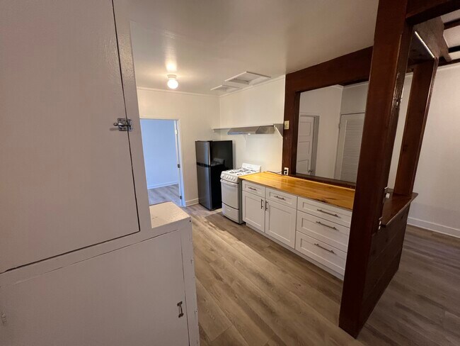 Kitchen into bedroom - 1419 N Topanga Canyon Blvd