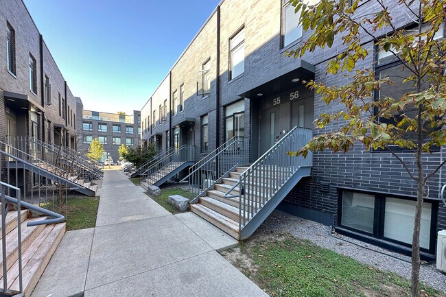 Building Photo - Contemporary 3-Bedroom Furnished Apartment...