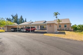 Building Photo - 16830 Sanibel Sunset Ct