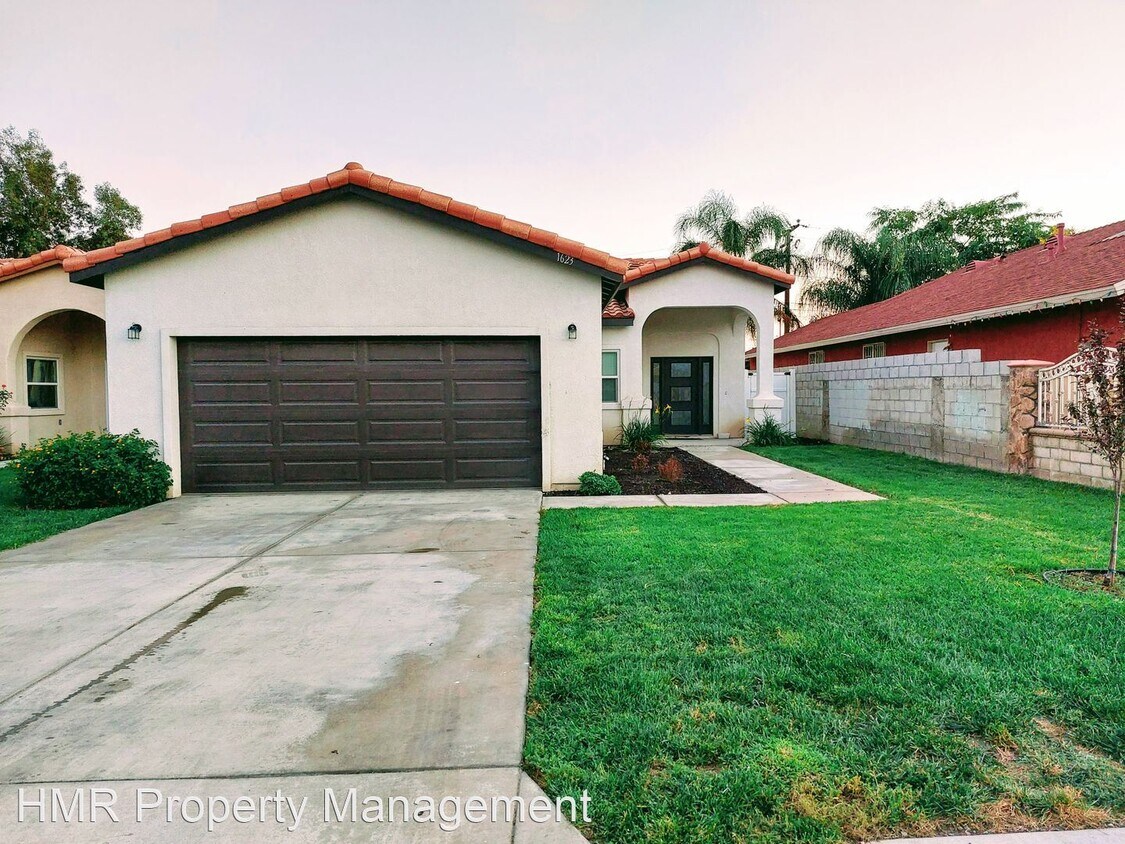 Foto principal - 4 br, 2 bath House - 1623 W. Congress St.