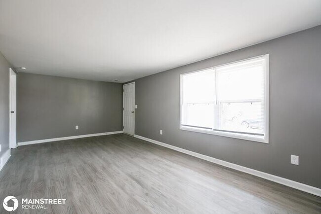 Building Photo - 5657 N Tullis Ave