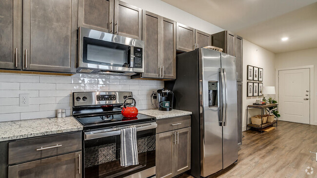 Kitchen with Energy-Efficient Stainless Steel Appliances - Cortland Chisholm Trail