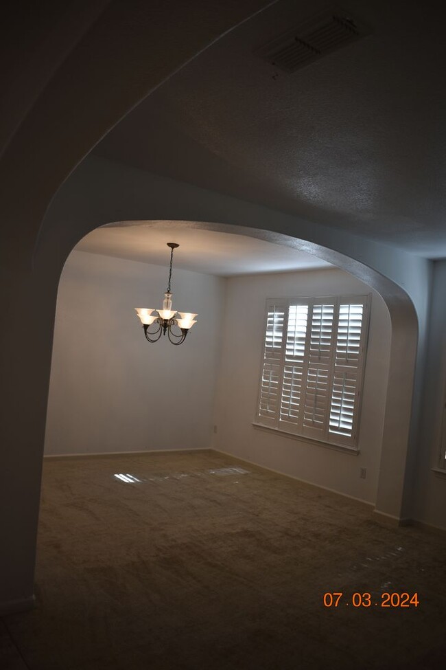 Building Photo - Gorgeous Five Bedroom Home with Four Car G...