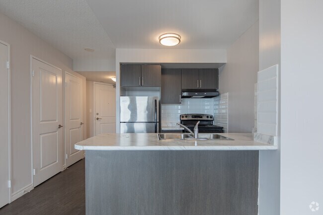 3 chambres, 2 salles de bain - 966 pi² - Cuisine - Primo Tower