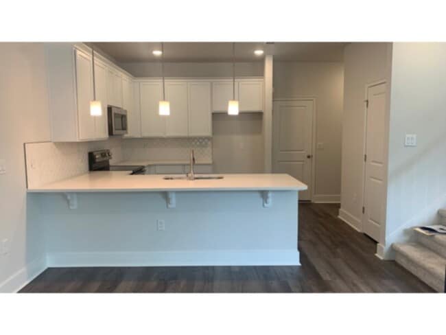 Building Photo - 3 bed 2.5 bath LOFT townhome in HARMONY