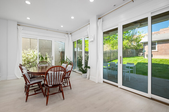 3 sliding glass doors. - 31 Dartford Ave