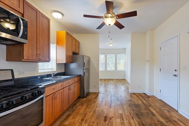 Building Photo - 1234 W 49th Pl
